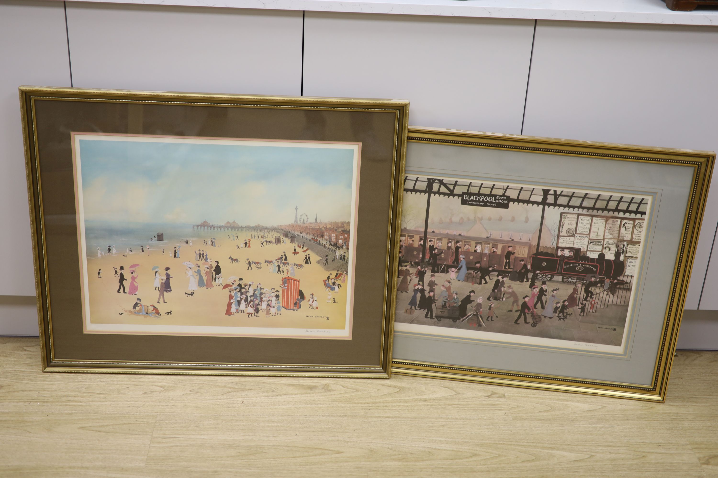 Helen Bradley, two signed prints, Blackpool Station and Blackpool Sands, both signed in pencil, overall 40 x 57cm and 48 x 62cm